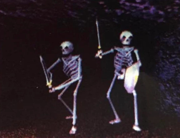 Computer rendering of two low-fidelity skeletons in a cave, one with with a sword, and one with a sword and shield